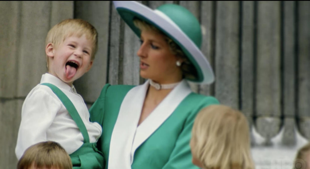 Image: Princess Diana holding Prince Harry in 'Diana, Our Mother: Her Life and Legacy'. (HBO Docs / Youtube)