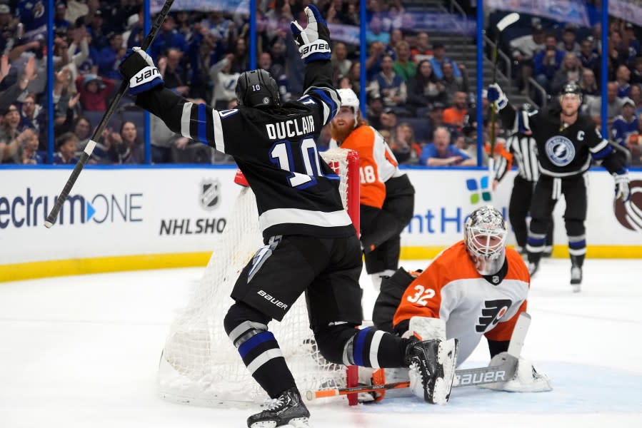 Tampa Bay Lightning left winger Anthony Duclair (10) celebrates after scoring past Philadelphia Flyers goaltender Felix Sandstrom (32) during the second period of an NHL hockey game Saturday, March 9, 2024, in Tampa, Fla. (AP Photo/Chris O’Meara)