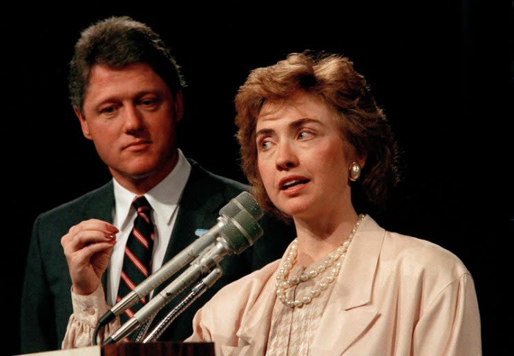 First lady of Arkansas Hillary Rodham Clinton, right, speaks at a conference at the Excelsior Hotel in Little Rock, Ark., as her husband, Governor Bill Clinton, left, looks on, July 16, 1987. (AP Photo)