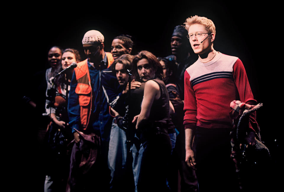 Anthony Rapp, at right, and other members of the original cast in a scene from the musical 