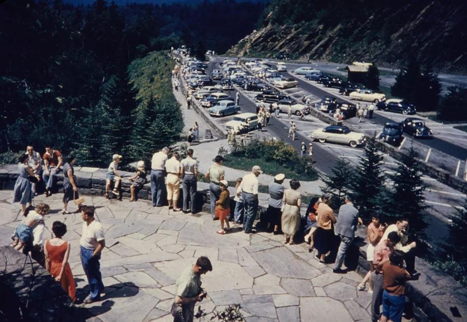 Through the generations since the park’s creation in 1934, visitors from all over the world, such as those in this archival photo, have enjoyed breathtaking views like that at Newfound Gap.