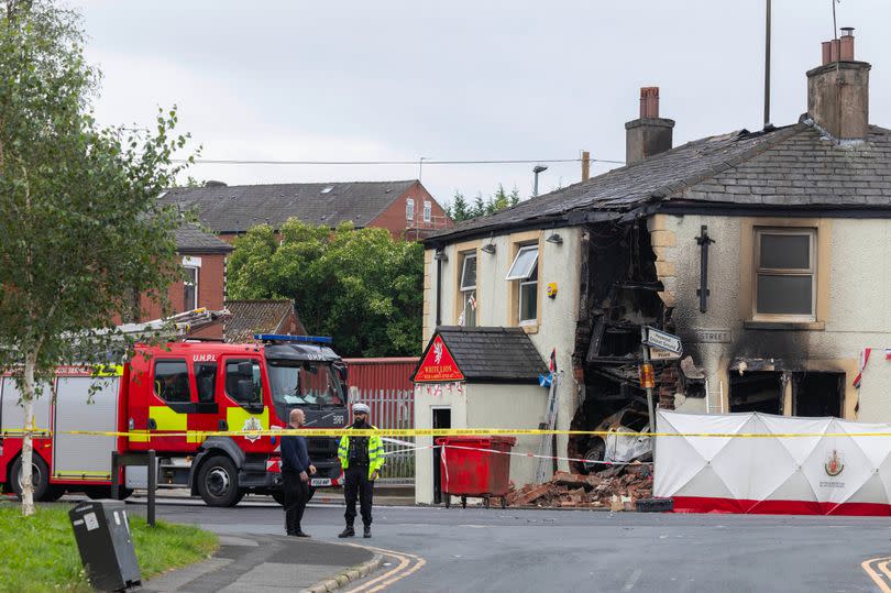 Fire crews and police at a scene