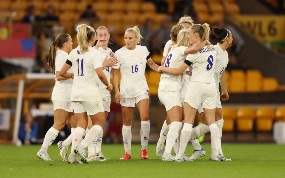 Chloe Kelly of England celebrates with her team mates after scoring a goal - GETTY IMAGES