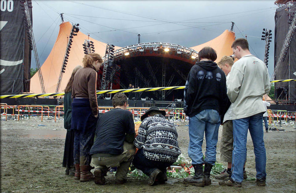 <div class="inline-image__caption"><p>Fans lay down flowers in Roskilde, 30 kilometers west of Copenhagen on Saturday July 1, 2000, where eight fans were trampled to death late June 30. The disaster occurred when the crowd surged toward the stage during a performance by Pearl Jam. A further 26 people needed hospital treatment.</p></div> <div class="inline-image__credit">Reuters</div>