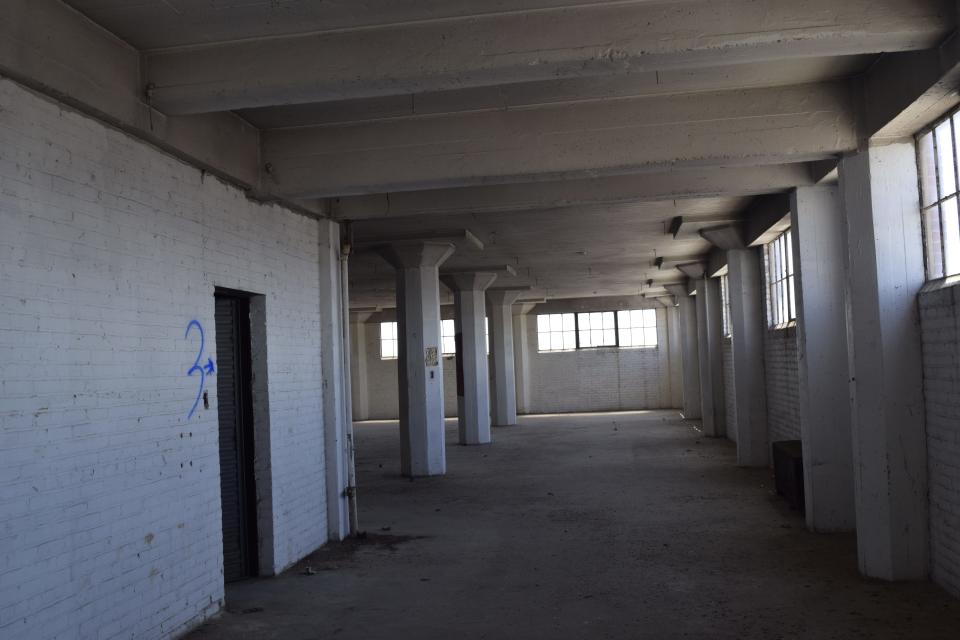 The interior of the Lee hardware building. Preliminary work is underway on phases 2 and 3 of the Lee Lofts complex near Santa Fe Avenue and Elm Street.