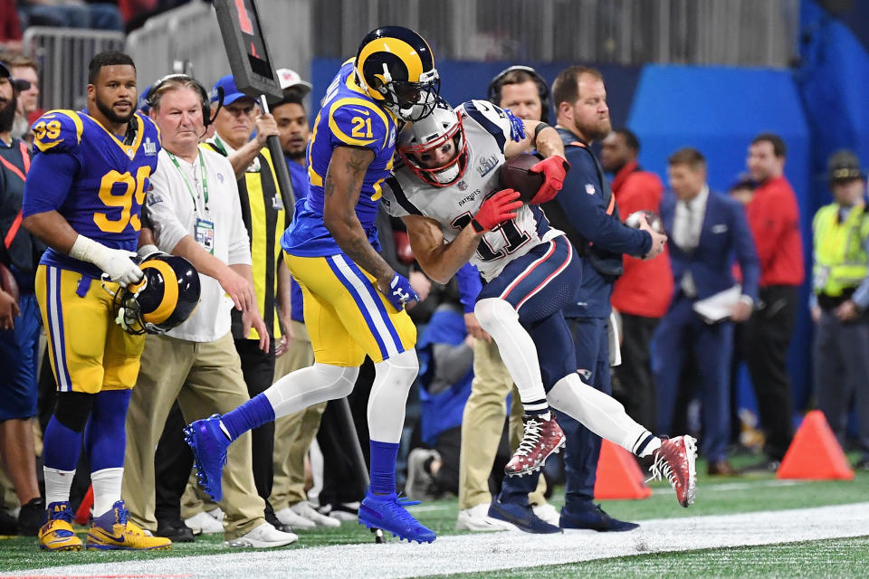 <p>Julian Edelman #11 of the New England Patriots catche a pass against Aqib Talib #21 of the Los Angeles Rams in the first half during Super Bowl LIII at Mercedes-Benz Stadium on February 3, 2019 in Atlanta, Georgia. (Photo by Harry How/Getty Images) </p>