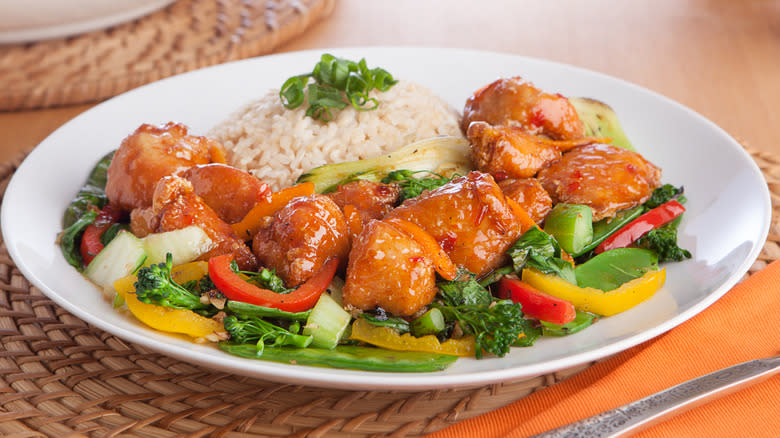 orange chicken with vegetables and rice