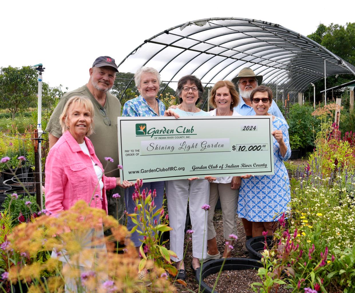 From left: Cindy Day, Jasmine Circle; Greg Valiades, Shining Light Garden; Kitty Kennedy, Seagrape Circle; Nancy Shaver, Allamanda Circle; Carol Christianson, Jasmine Circle; Joel Bray, Shining Light founder; and Nancy Edmiston, Jasmine Circle.