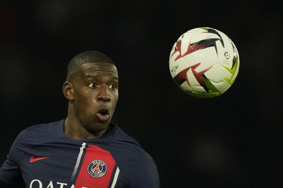 PSG's Nordi Mukiele controls the ball during the French League One soccer match between Paris Saint-Germain and Lille at the Parc des Princes stadium in Paris, France, Saturday, Feb. 10, 2024. (AP Photo/Thibault Camus)