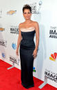 Following in Tatyana's footsteps was the equally stunning Halle Berry, who kept things relatively simple -- yet incredibly sexy -- in a strapless Vivienne Westwood column gown and dripping diamond earrings. Gabriel Aubry, eat your heart out! (2/1/2013)