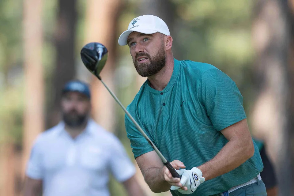 <p>David Calvert/Getty Images</p> Travis Kelce golfs at the American Century Championship on July 12, 2024