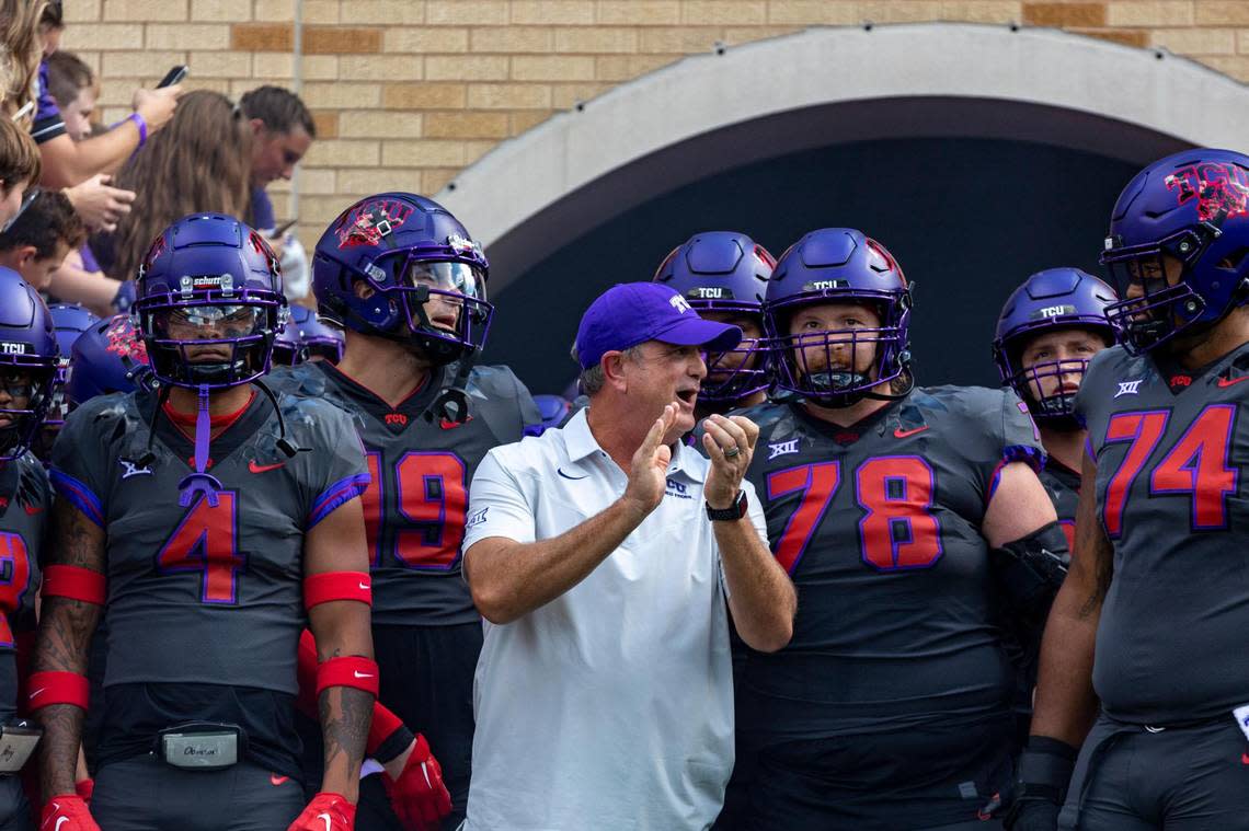 TCU head coach Sonny Dykes gathers with his team before their game against OSU begins at the Amon G. Carter Stadium in Fort Worth, on Saturday, Oct. 16, 2022. Madeleine Cook/mcook@star-telegram.com
