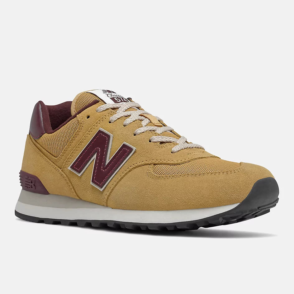 Gold and maroon New Balance shoes