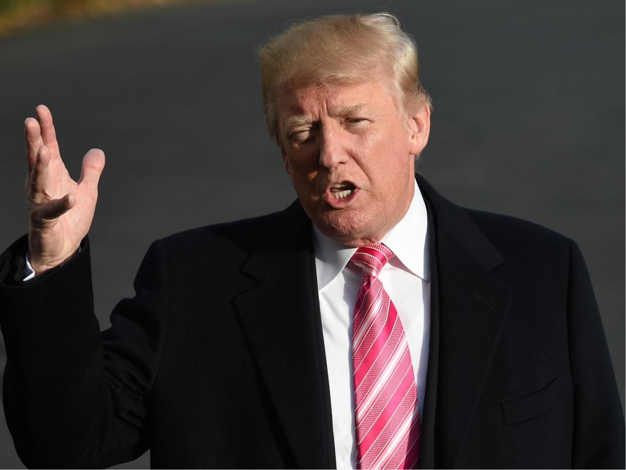 US President Donald Trump speaks to the press before departing from the White House on 21 November 2017: ANDREW CABALLERO-REYNOLDS/AFP/Getty Images