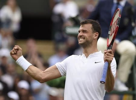 Britain Tennis - Wimbledon - All England Lawn Tennis & Croquet Club, Wimbledon, England - 30/6/16 Bulgaria's Grigor Dimitrov celebrates winning his match against France's Gilles Simon REUTERS/Tony O'Brien