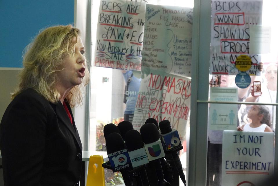 Anti-mask and anti-testing protesters shout during a news conference by Broward County Schools interim Superintendent Vickie Cartwright on Aug. 24, 2021, in Fort Lauderdale, Fla.