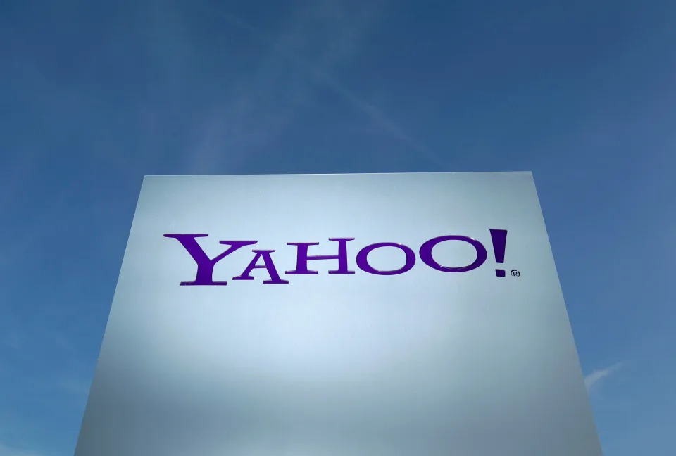 A Yahoo logo is pictured in front of a building in Rolle, Switzerland December 12, 2012.   REUTERS/Denis Balibouse/File Photo