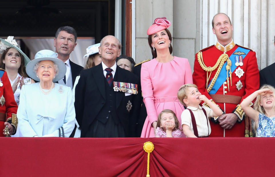 The royal family watching a fly by by a Royal Air Force plane. (Photo: Chris Jackson via Getty Images)