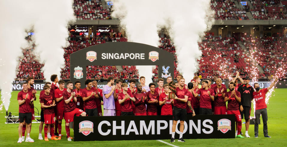 Liverpool players celebrate winning the Standard Chartered Singapore Trophy after a 2-0 win over Crystal Palace at the National Stadium. (PHOTO: Jay Chan/Yahoo News Singapore)