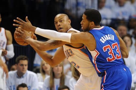 Oklahoma City Thunder forward Caron Butler (2) handles the ball agains tLos Angeles Clippers forward Danny Granger (33) during the second quarter in game five of the second round of the 2014 NBA Playoffs at Chesapeake Energy Arena. May 13, 2014; Oklahoma City, OK, USA; Mark D. Smith-USA TODAY Sports