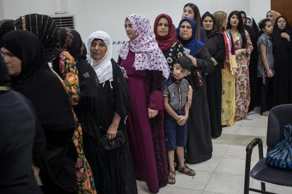 Historic: Women are seen waiting in line to cast their referendum vote (Getty Images)