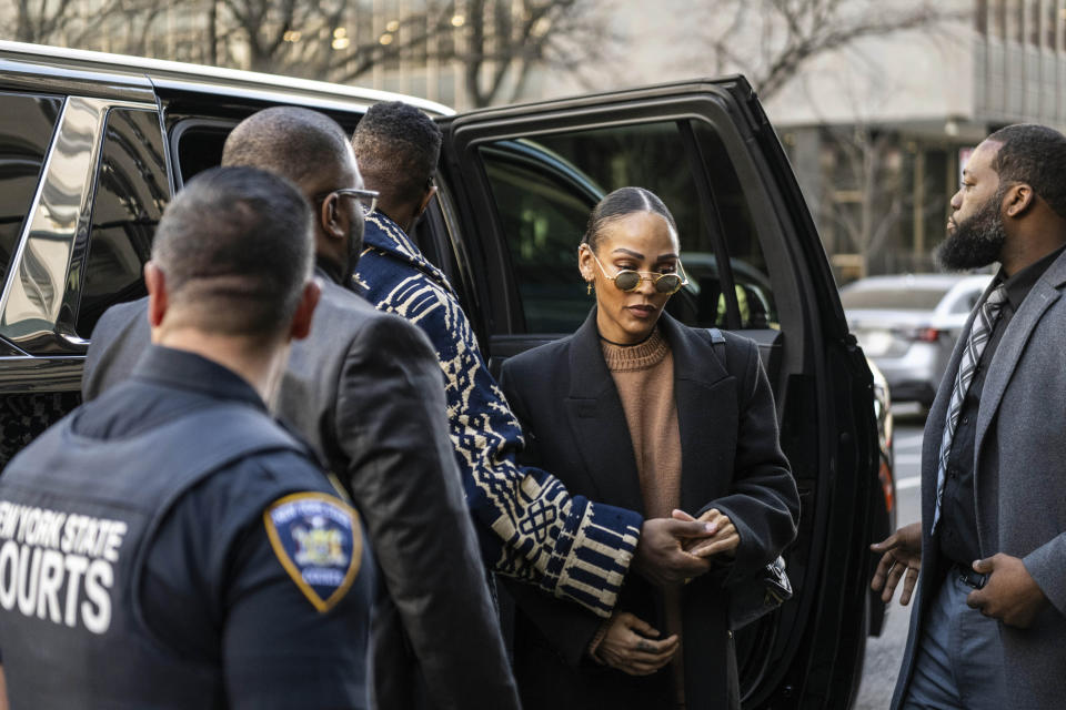 Jonathan Majors and Meagan Good arrive at Criminal Court on Monday, April 8, 2024 in New York. (AP Photo/Brittainy Newman)