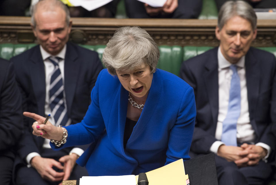 Britain's Prime Minister Theresa May speaks during a debate before a no-confidence vote on Theresa May raised by opposition Labour Party leader Jeremy Corbyn, in the House of Commons, London, Wednesday Jan. 16, 2019. In a historic defeat for the government Tuesday, Britain's Parliament discarded May's Brexit deal to split from the European Union, and May now faces a parliamentary vote of no-confidence Wednesday. (Mark Duffy, UK Parliament via AP)