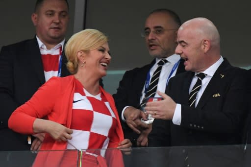 Croatia President Kolinda Grabar-Kitarovic showed FIFA president Gianni Infantino that she was wearing the team's colours in Sochi