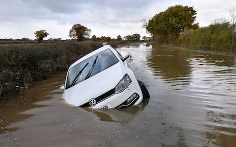 A car sits in flood water in Fishlake - Credit: Anthony Devlin Getty&nbsp;&nbsp;