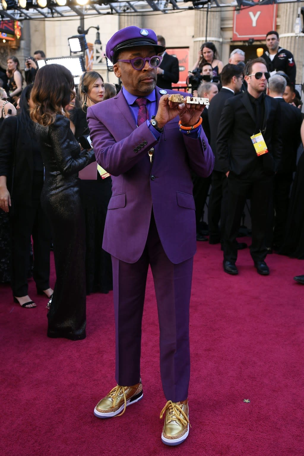 Spike Lee, wearing gold Nike Air Jordan 3s, arrives at the 91st Academy Awards at the Dolby Theatre on Feb. 24, 2019, in Los Angeles. (Photo by Robert Hanashiro-USA TODAY NETWORK)