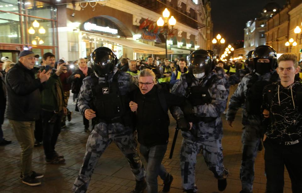 Russia Police officers, one of them with letter "Z" on his uniform, a symbol of support of the military invasion in Ukraine, detains a protester during an unsanctioned anti-war protest rally at Arbat street, on September 21, 2022, in Moscow, Russia. More than 500 people in Russian cities were detained during protest rallies against the mobilization for war against Ukraine, announced by President Putin on Wednesday.