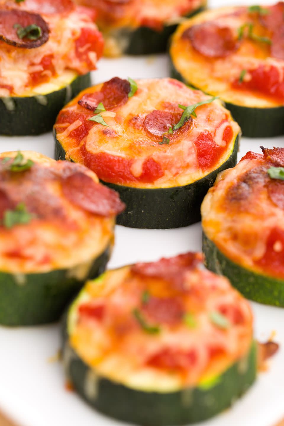 <p>Eating healthy should never mean giving up pizza.</p><p>Get the recipe from <a href="/cooking/recipe-ideas/recipes/a43638/mini-zucchini-pizzas-recipe/" data-ylk="slk:Delish" class="link ">Delish</a>.</p>
