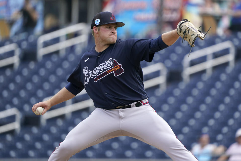 Atlanta Braves pitcher Bryce Elder throws during the first inning of a spring training baseball game against the Houston Astros Friday, March 3, 2023, in West Palm Beach, Fla. (AP Photo/Jeff Roberson)