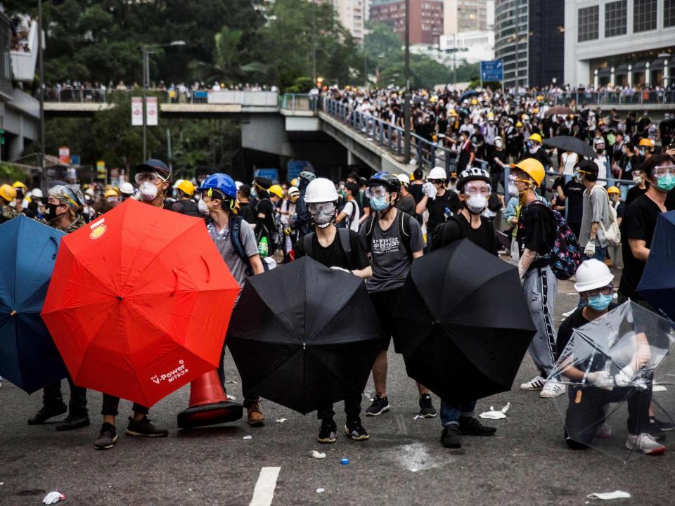 The moment the 25-year-old protester got home from demonstrations that turned violent – tear gas still stinging her eyes – she knew what she had to do: delete all of her Chinese phone apps.WeChat was gone. So was Alipay and the shopping app Taobao. She then installed a virtual private network on her smartphone to use with the secure messaging app Telegram in an attempt to stay hidden from cyber-monitors.“I’m just doing anything” to stay ahead of police surveillance and hide her identity, said the protester.She asked to be referred only by her first name, Alexa, to avoid drawing the attention of authorities amid the most serious groundswell against Chinese-directed rule in Hong Kong since 2014.Protests that expanded over the past week against a bill allowing extraditions to mainland China were marked by something unprecedented: a coordinated effort by demonstrators to leave no trace for authorities and their enhanced tracking systems.Protesters used only secure digital messaging apps such as Telegram, and otherwise went completely analogue in their movements: buying single ride subway tickets instead of prepaid stored value cards, forgoing credit cards and mobile payments in favour of cash, and taking no selfies or photos of the chaos.They wore face masks to obscure themselves from CCTV and in fear of facial recognition software, and bought fresh pay-as-you-go SIM cards.And, unlike the pro-democracy movement in 2014, the latest demonstrations also have remained intentionally leaderless in another attempt to frustrate police, who have used tear gas and rubber bullets against the crowds.Hong Kong chief executive Carrie Lam announced the postponement of the extradition bill, saying she hoped to return peace to the streets of the city, last week. But the measure was not fully withdrawn and Ms Lam still expressed support.Protesters, meanwhile, have again taken to the streets for another major show of defiance.Amid the chaos, Hong Kong has offered a picture of what it looks like to stage mass civil disobedience in the age of the surveillance state.“The Chinese government will do a lot of things to try to monitor their own people,” said Bonnie Leung, a leader of the Hong Kong-based Civil Human Rights Front (CHRF).Ms Leung cited media coverage of Chinese use of artificial intelligence to track individuals and its social credit score system.“We believe that could happen to Hong Kong, too,” she said.The core of the protests is over the belief that Beijing – which was handed back control of the former British colony more than 20 years ago – is increasingly stripping Hong Kong of its cherished freedoms and autonomy.But the identity-masking efforts by the protesters also reflects deep suspicions that lines between China and Hong Kong no longer exist – including close cooperation between Hong Kong police and their mainland counterparts who have among the most advanced and intrusive surveillance systems.“It is the fundamental reason people are protesting in the first place,” said Antony Dapiran, who wrote a book on protest culture in Hong Kong.“They don’t trust Beijing, they don’t trust their authorities and the legal system, and they don’t like the blurring of lines between Beijing and Hong Kong.”For many who had taken to the streets over the past week, the fight was a familiar one.In 2014, protesters occupied Hong Kong’s main arteries for 79 days demanding full universal suffrage in the territory.Prominent student leaders and activists marshalled up support night after night in mini cities that had been set up on Hong Kong’s thoroughfares, until they were eventually cleared out by police.Today, all of the most prominent leaders of that movement – Joshua Wong, only a teenager at the time of the protests, legal scholar Benny Tai and Chan Kin-man, a sociology professor – are in jail.The masses gathered around government buildings this week were without clear leaders.Demonstrators shared protest tips and security measures with people they had met just hours before to avoid a similar fate. Meet-ups were primarily planned on Telegram, which became the top trending app on the iPhone app store in Hong Kong in the days leading up to the protest.“Information on personal safety was passed around on Telegram channels and group chats,” said Caden, a 21-year-old Hong Kong student in Indiana who returned home early to participate.He was among an estimated one million people marching on 7 June to begin the protest movement.On the groups, Caden received a barrage of advice which included changing your username on Telegram so it sounds nothing like your actual name, changing your phone number associated with app and using SIM cards without a contract.“We are much more cautious now for sure than in 2014. Back then, it was still kind of rare for the police to arrest people through social media,” Caden said, declining to give his full name for fear of retribution. “All of this is definitely new for most people there.”Alexa noticed messages on Facebook, used by an older generation of Hong Kongers, warning people to mask their digital footprints and go cashless.“People keep telling each other not to take pictures during the protest, and only to take wide shots without people’s faces on them,” she said.It marked a huge change in sentiment for her, someone who had been attending peaceful demonstrations in Hong Kong with her family for years.“We’d always take pictures and upload them to Facebook and so on, it would tell people you are there at the scene,” she said.“But by now, everyone [has] equated the bill to cracking down on the Hong Kong legal system. We are all afraid that it won’t exist anymore.”Hours before Wednesday’s occupation of Hong Kong roads, Hong Kong police arrested Ivan Ip, a coordinator of a Telegram group with thousands of people, in his home. He is currently out on bail.Telegram also reported a massive cyber-attack, which the company said likely originated from China and were timed with the protest.Samantha Hoffman, a fellow at the Australian Strategic Policy Institute’s Cyber Centre, said data collection methods used in China have specifically been designed to intimidate people from taking part in demonstrations.She described the strategy as “killing the root before the weed can grow.”“It’s a form of pre-emptive security,” she saidStill, researchers say it has been difficult to figure out the extent to which Hong Kong Police Force cooperates with the mainland on surveillance technology and tools.The Hong Kong force says it sends around 150 officials every year for “ideological and practical” training at elite mainland police academies.A larger number also receive regular training in “hand-to-hand combat, interrogation skills, criminal investigation and gun use,” according to news releases from the Chinese government.And when a high speed rail link opened connecting Beijing to Hong Kong, Chinese police were allowed to enforce mainland laws in the rail terminus. The rail link opened last year, marking the first time mainland police were allowed to patrol Hong Kong as part of joint immigration checks.Maya Wang, a senior China researcher at Human Rights Watch, said there is “very little transparency” about the cooperation between Hong Kong police and mainland authorities.Wang also noted that Hong Kong is moving ahead with plans for more “smart city” initiatives – with little clarity on which companies would be assisting them in that task.“People are concerned that their electronic traces can be collected and monitored as the city becomes more digitised,” she said.“What about the Chinese companies that are assisting or involved with the collection of data in Hong Kong? Would they be passing that data back?”Alexa, Caden and other protesters interviewed by The Washington Post say they remain undeterred and will continue to show up at demonstrations.They have masks and goggles prepared, they say, both as a shield against police tactics like pepper spray and also to avoid potential facial recognition or other surveillance software.“I do not think this is overly cautious. If we read books by George Orwell and we read histories about Communist Parties, of course this is not overly cautious,” said Ms Leung of CHRF.“If I was not some sort of leader or coordinator of the Civil Human Rights Front, I may wear a face mask as well,” she added. “I can totally understand why people would want to hide their identities.”© The Washington Post