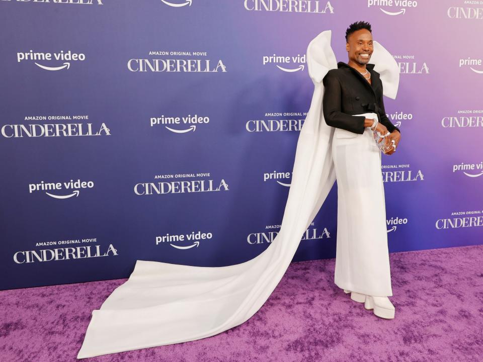 Billy Porter at the 2021 premiere of "Cinderella" wearing a large white bow on his back