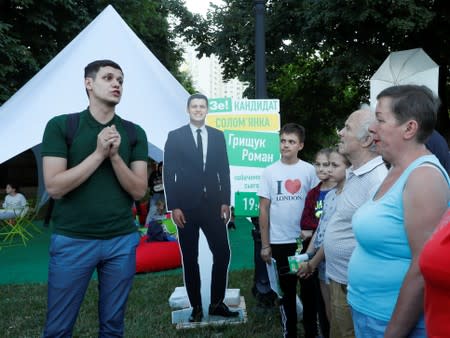 Roman Hryshchuk speaks during a meeting with voters in Kiev