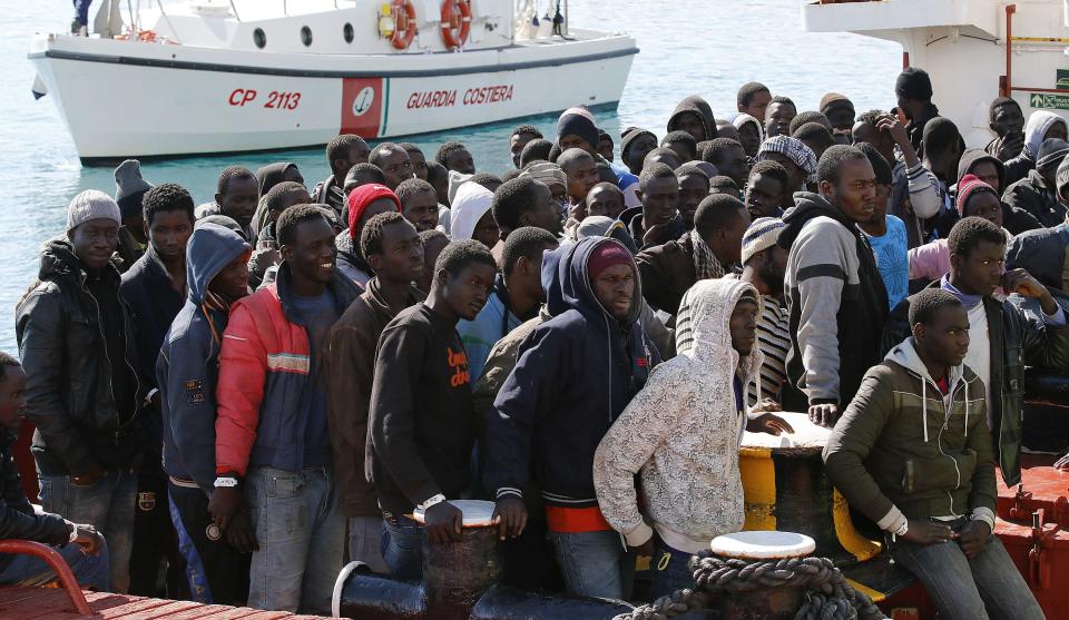 Migrants arrive at the Sicilian harbour of Pozzallo