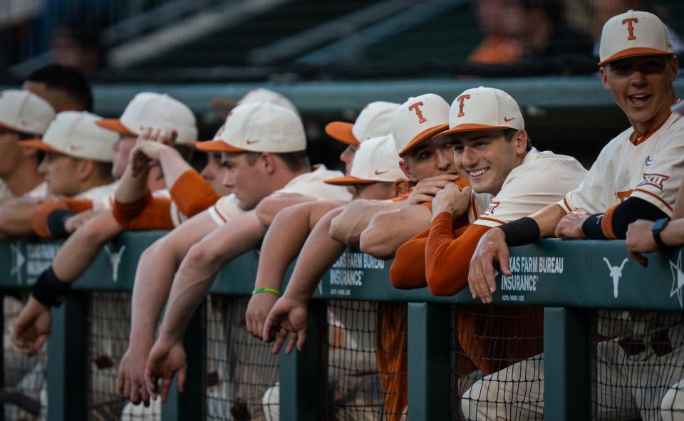 Texas players smile and chat ahead of the March 5 game against Texas A&M at UFCU Disch-Falk Field. the Longhorns went 36-24 this season.