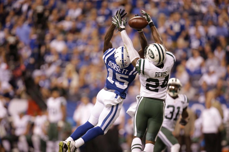 New York Jets cornerback Darrelle Revis (24) breaks up a pass intended for Indianapolis Colts wide receiver Phillip Dorsett (15) in the second half of an NFL football game in Indianapolis, Monday, Sept. 21, 2015.  (AP Photo/AJ Mast)