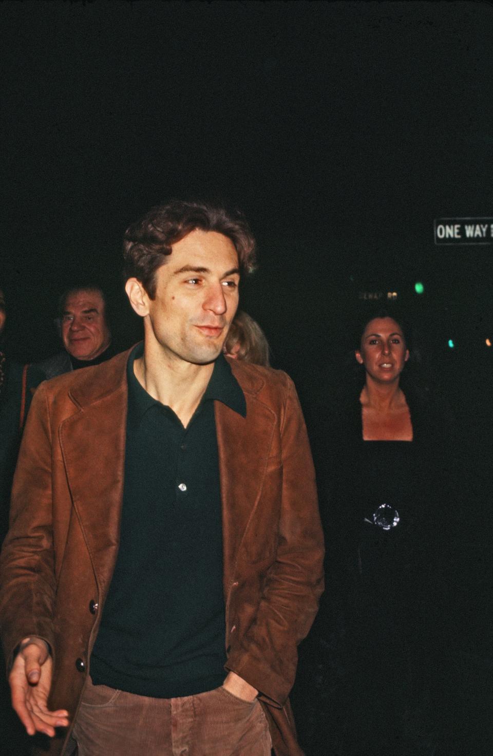 Robert De Niro wears a suede jacket and enjoys a night on the town circa the mid-1970s in New York, New York