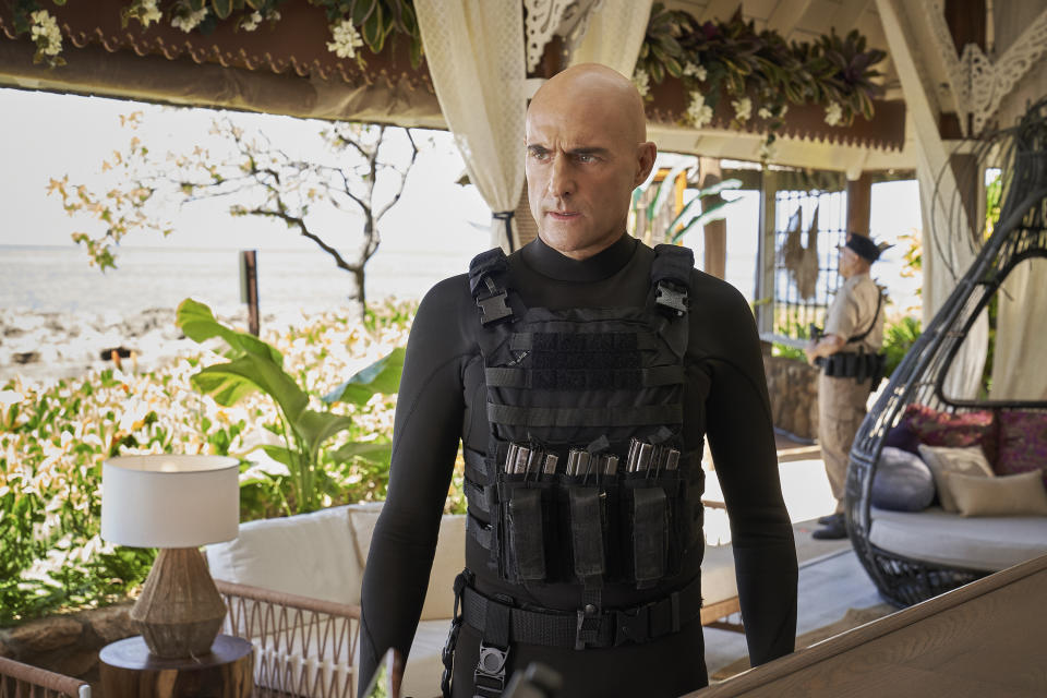 This image released by Netflix shows Mark Strong in a scene from the film "Murder Mystery 2." (Scott Yamano/Netflix via AP)