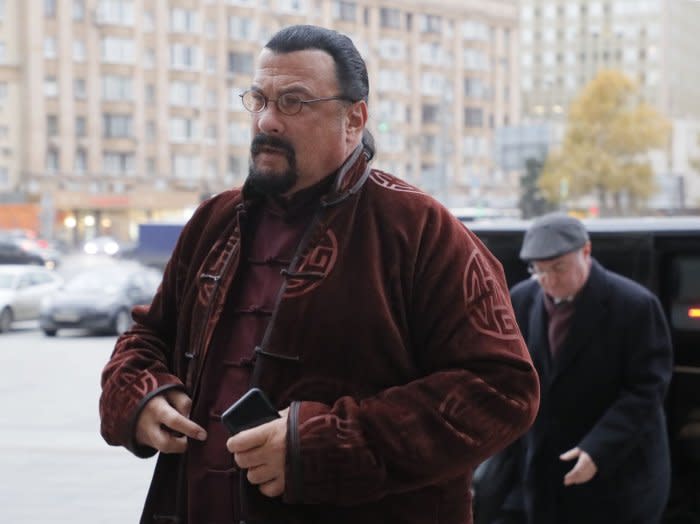Steven Seagal walks to the Russian Foreign Ministry office in Moscow on November 9, 2018. The actor turns 70 on April 10. File Photo by Yuri Kochetkov/EPA-EFE