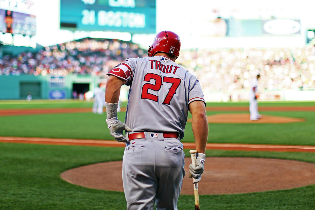 BOSTON, MA - JUNE 26:  Mike Trout #27 of the Los Angeles Angels walks towards the on deck circle before a game against the Boston Red Sox at Fenway Park on June 26, 2018 in Boston, Massachusetts.  (Photo by Adam Glanzman/Getty Images)