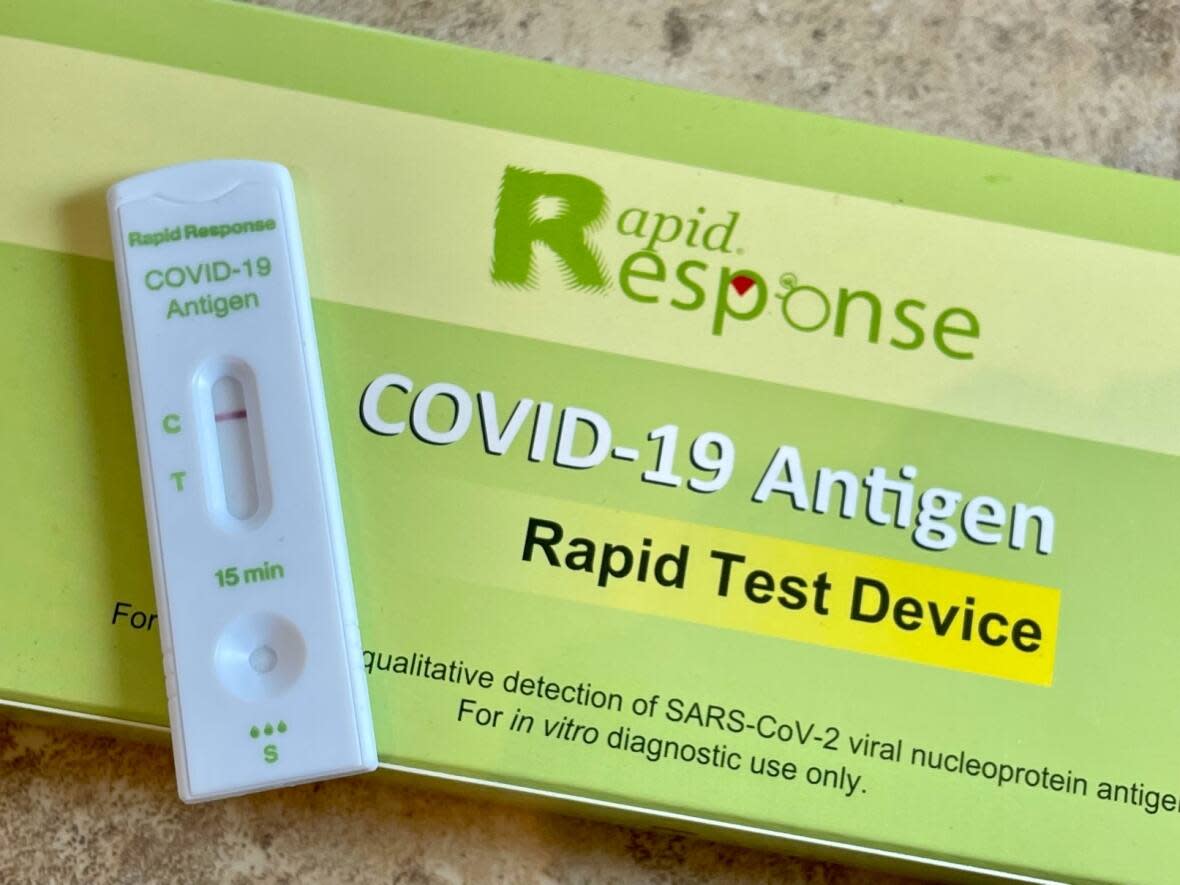 Reading both the instructions and the result of a COVID-19 rapid test are difficult for those with impaired sight. (Alexandre Silberman/CBC - image credit)