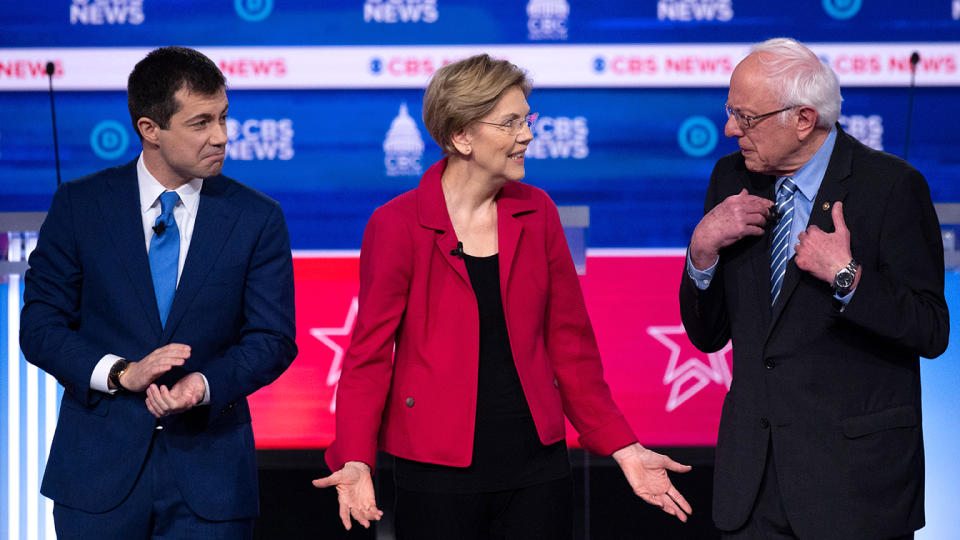 Pete Buttigieg, Sen. Elizabeth Warren and Sen. Bernie Sanders arrive onstage ahead of the tenth Democratic primary debate of the 2020 presidential campaign season co-hosted by CBS News and the Congressional Black Caucus Institute at the Gaillard Center in Charleston, South Carolina, on February 25, 2020. (Jim Watson/AFP via Getty Images)