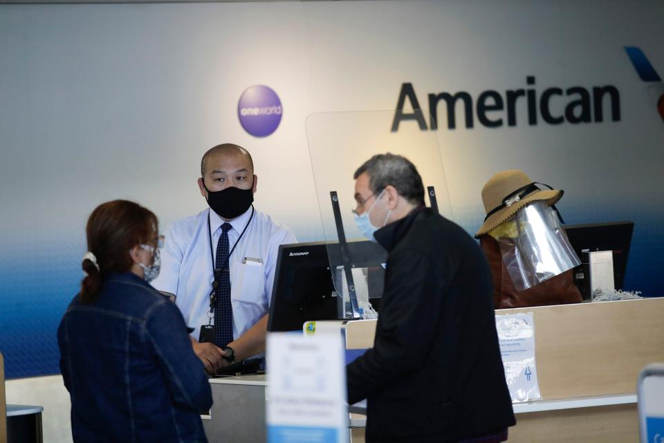 American Airlines worker airport pandemic coronavirus covid-19