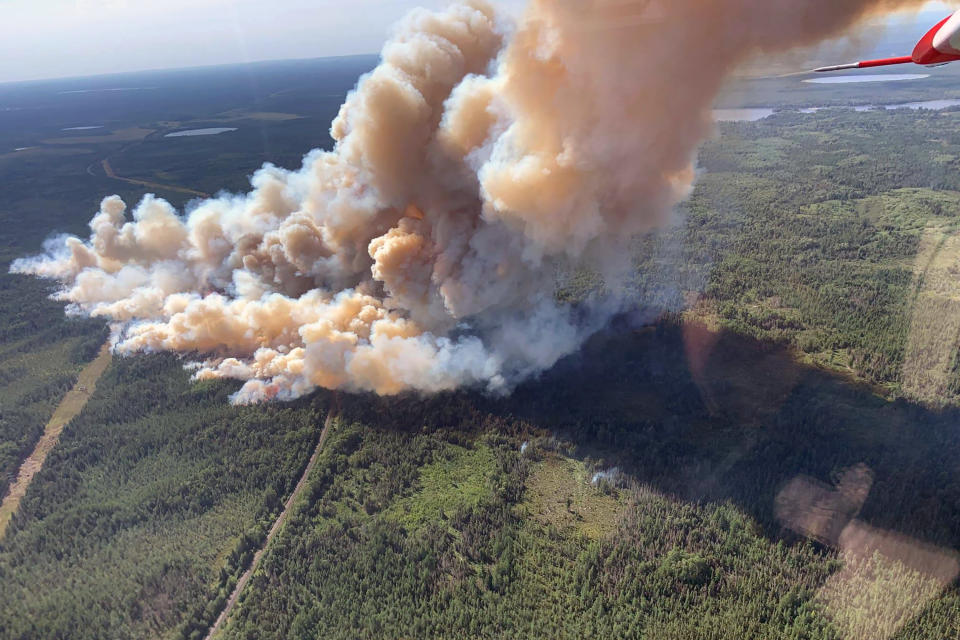 This Aug. 15, 2021, photo provided by U.S. Forest Service-Superior National Forest shows a rapidly growing wildfire in northeastern Minnesota that has prompted some evacuations, the U.S. Forest Service said Monday, Aug. 16, 2021. The fire was spotted around 3 p.m. Sunday near Greenwood Lake, about 15 miles southwest of Isabella, in the Superior National Forest. (Nick Petrack/Forest Service-Superior National Forest via AP)