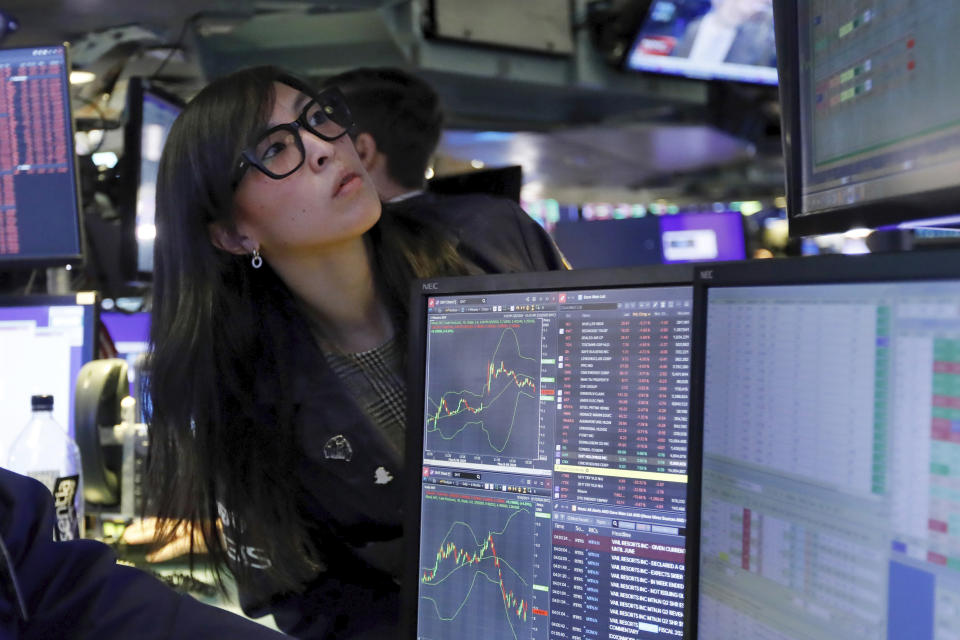 Specialist Erica Fredrickson works on the floor of the New York Stock Exchange, Monday, March 9, 2020. The Dow Jones Industrial Average sank 7.8%, its steepest drop since the financial crisis of 2008, as a free-fall in oil prices and worsening fears of fallout from the spreading coronavirus outbreak seize markets. (AP Photo/Richard Drew)