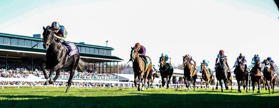 Meditate, with Ryan Moore up, wins the Breeders' Cup Juvenile Fillies Turf race at Keeneland Race Course on Friday, November 4, 2022, in Lexington, Kentucky