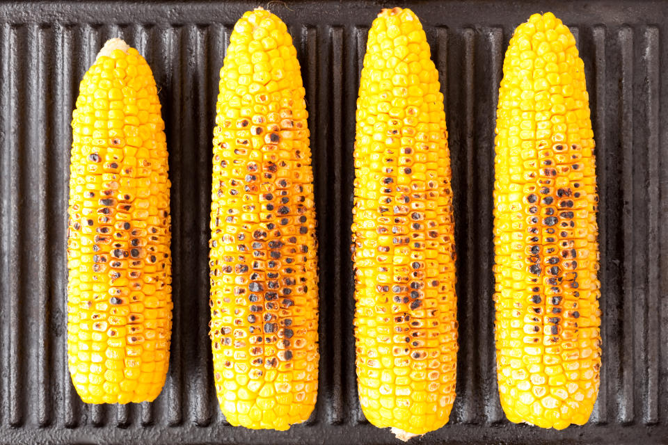 Curious how to grill corn? A chef weighs in on the ins and outs of getting the perfect ear of grilled goodness. (Photo: Getty Creative)